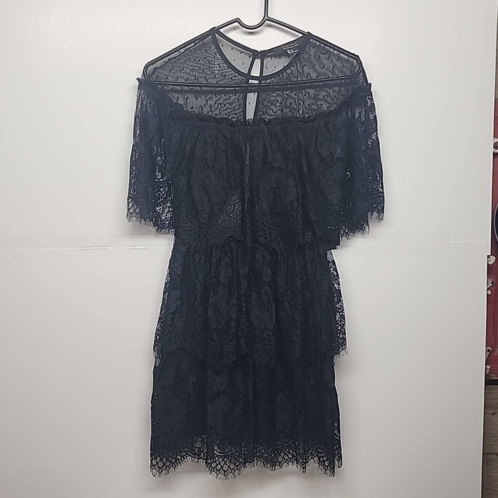 Little black lace lined dress.  Size s.  Super cute.  Never worn.